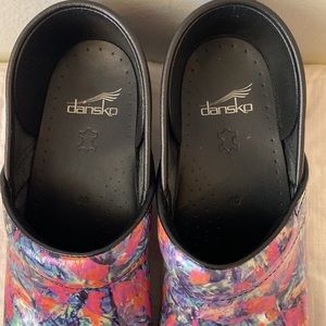 Awesome Dansko clogs. Patent finish. Pink, aqua, blue abstract print. Size 40